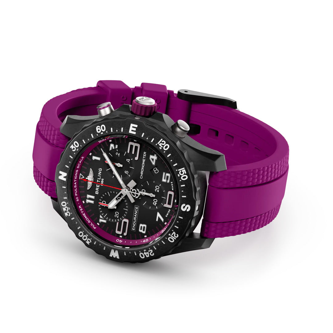 Explore the BREITLING Endurance Pro 38, an athleisure watch with a sporty black and purple design. It boasts a textured purple strap, black face with white numerals, minute markers, and a pink-accented bezel. The Breitlight® case features visible screws for both durability and style.