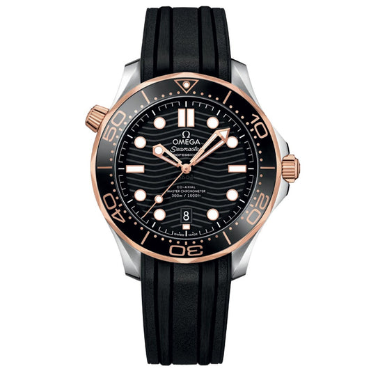 Introducing the OMEGA Seamaster Diver 300M Co-Axial Master Chronometer 42mm Watch, a luxurious timepiece that showcases a striking black wave-patterned dial accented with gold-tone details and a Ceragold diving scale. It features bold hour markers, luminous hands, and a date window positioned at 6 o'clock. Paired with an elegant black rubber strap, this watch embodies both sophistication and sportiness.