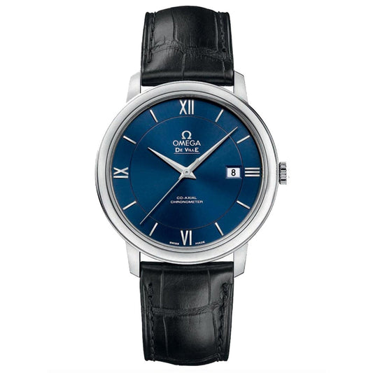 The OMEGA De Ville Prestige Co-Axial Chronometer 39.5mm Watch is a luxury timepiece that showcases a blue dial adorned with Roman numerals, silver hands, and a date display. Featuring a sleek black leather strap and an elegant silver case, it's the epitome of refined style.