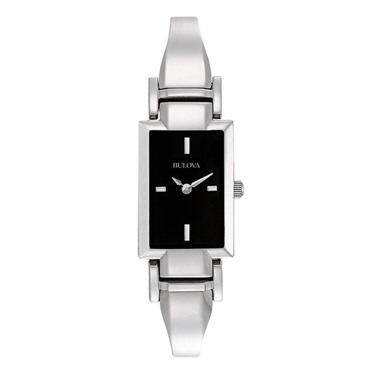 A sleek, rectangular silver Bulova Classic Quartz 19mm Watch with a minimalist black enamel dial and markers. It boasts an adjustable-link stainless steel bracelet that enhances its clean and modern aesthetic, with the brand name "Bulova" tastefully featured on the face alongside its two-hand movement.