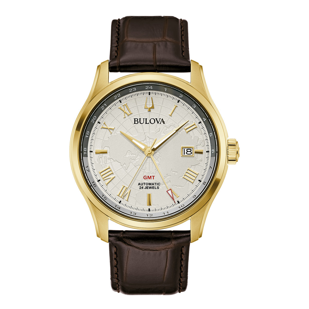 The Bulova Wilton Automatic GMT 43mm Watch from the Bulova Classic collection offers a gold timepiece with a brown leather strap. It sports a silver dial highlighted by gold hour markers, hands, and a date window at 3 o'clock. A red GMT function hand adds to the allure of the face's subtle world map design.