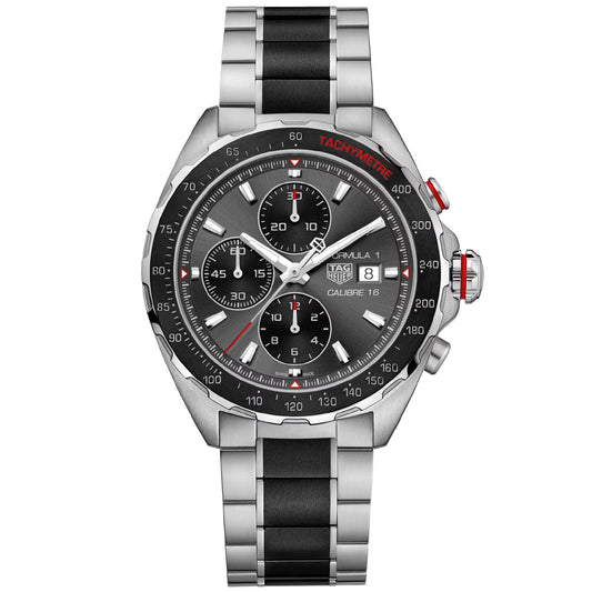 The TAG Heuer Formula 1 Chronograph Automatic 44mm Watch by TAG Heuer features a silver-tone design with a ceramic tachymeter bezel, three subdials, date display, and a metal bracelet accented by two black center links. Red accents highlight the dial, and the timepiece is powered by the renowned Calibre 16 automatic movement.