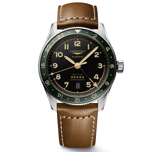 The Longines Spirit Zulu Time Automatic 42mm Watch showcases a brown leather strap and a round black dial, featuring a green bezel, gold markings, and a convenient date display at 6 o'clock. "Longines" and "Automatic" are prominently displayed on the dial of this sophisticated timepiece.