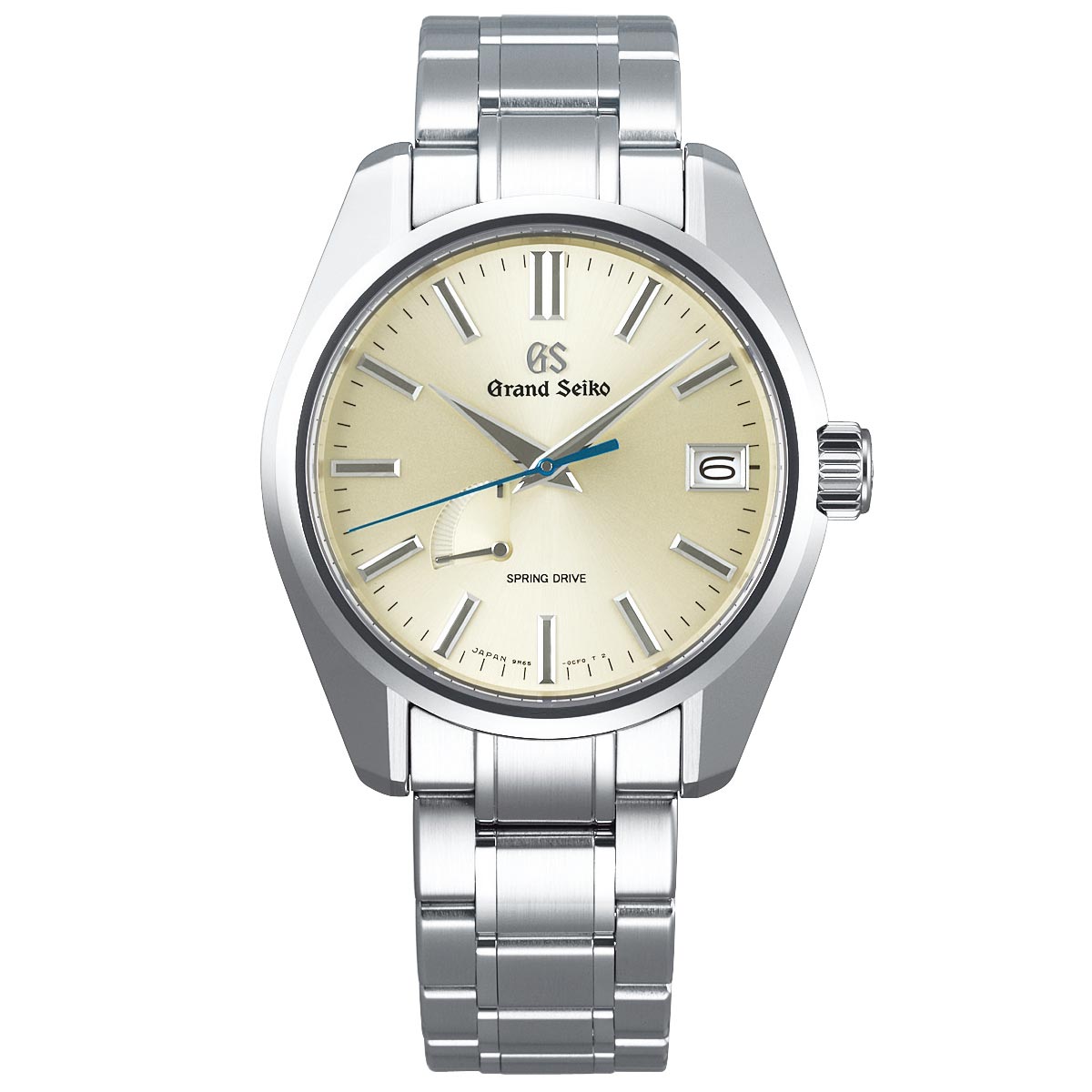 The Grand Seiko Heritage Collection Spring Drive 40mm Watch features a beige dial with silver hour markers, hands, and a blue second hand. It includes a date window at 3 o'clock, a polished stainless steel case and bracelet, and "Spring Drive" inscribed above 6 o'clock for added elegance.