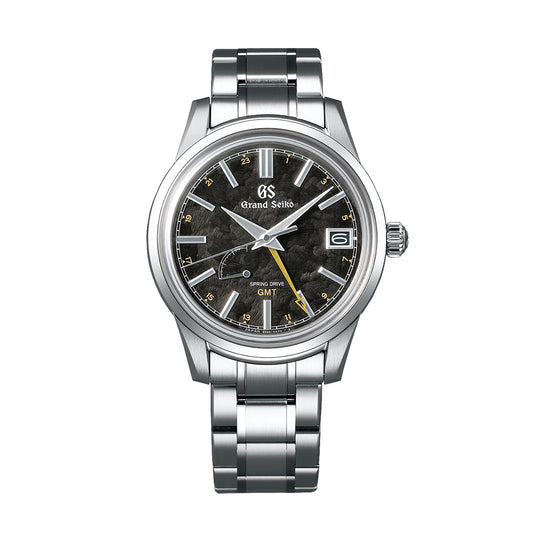 The Grand Seiko Elegance Collection Spring Drive GMT 40.2mm Watch from Grand Seiko features a stylish stainless steel bracelet, a dark textured dial complemented by silver hands and gold accents. It includes a date window positioned at 3 o'clock and a GMT hand to enhance its functionality.